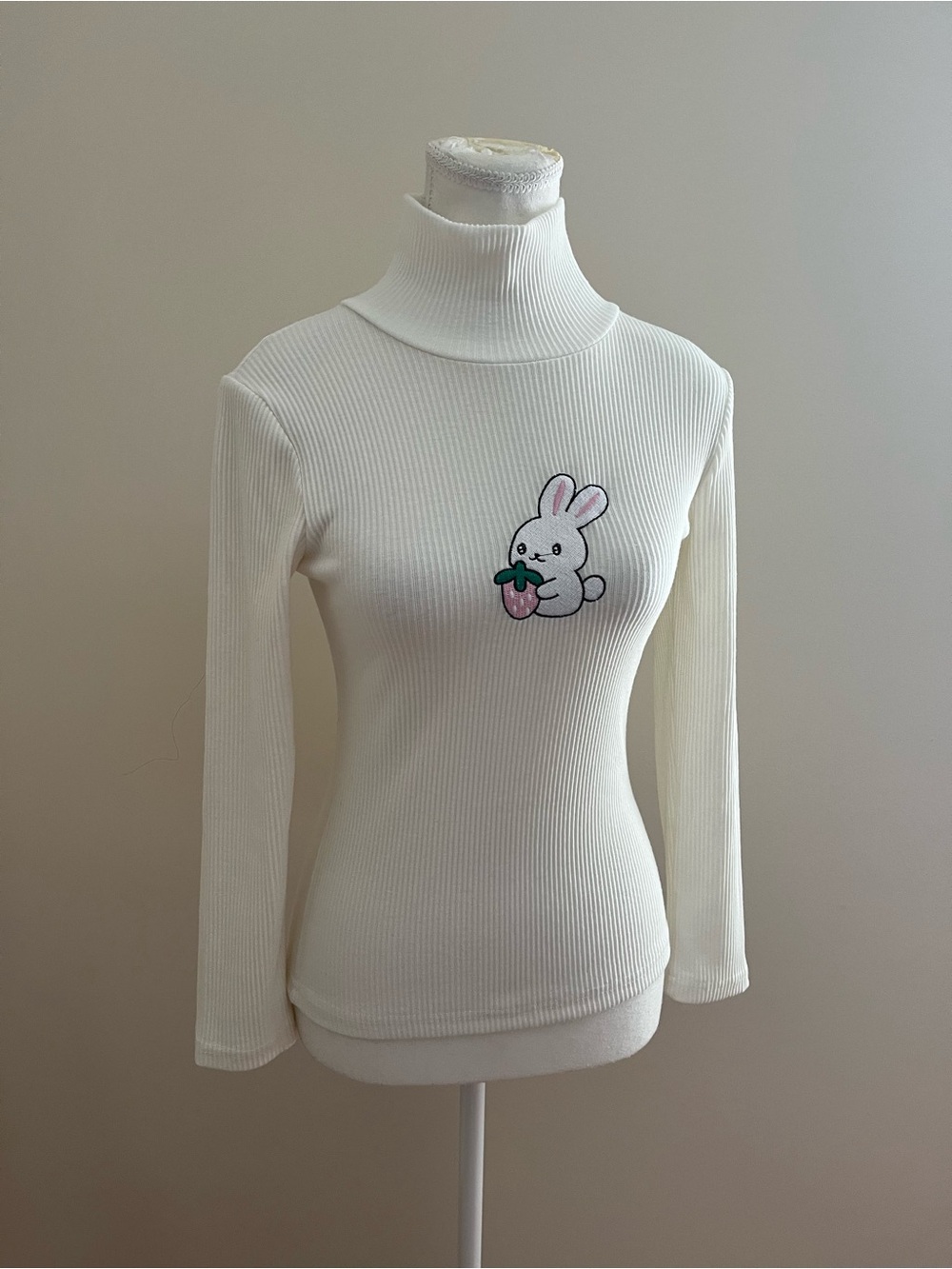 Women’s Cream Ribbed Turtleneck Sweater Tee with Bunny Patch